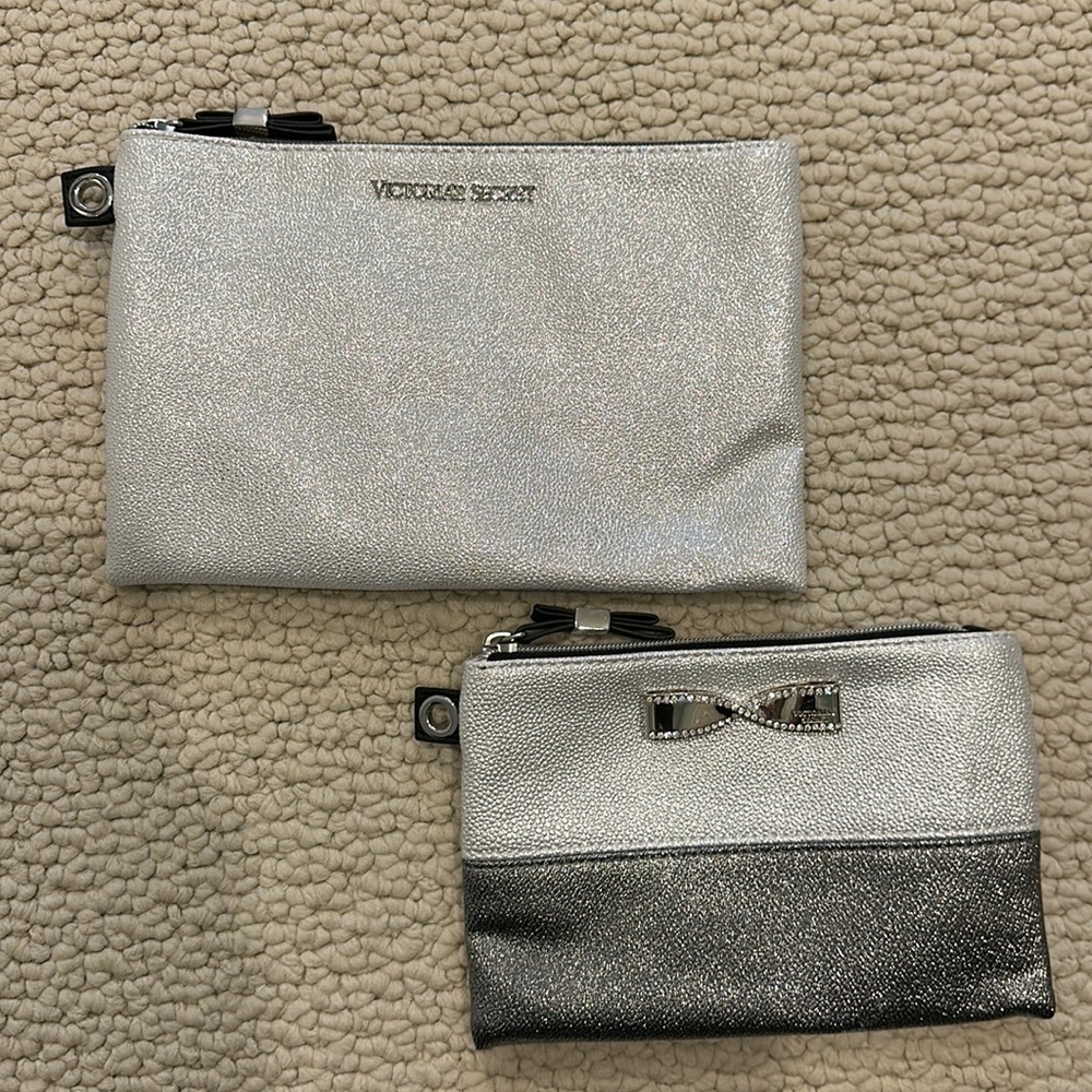 Victoria’s Secret set of two silver cosmetic bags